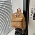 Mini sac à dos kaki pour femme avec texture plissée et détails de nœuds argentés - Marron