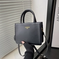 Classic black leather square tote bag with gold lettering and adjustable crossbody strap - Black