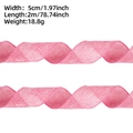 Dettaglio del nastro a rete rosa per regali di Pasqua con larghezza 5cm e bordo metallico - 2 Metri / Rosa
