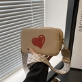 Beige pebble leather square camera bag with red heart and woven geometric shoulder strap - Khaki