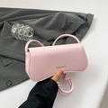Pink minimalist PU leather shoulder bag with knotted strap and gold fashion logo - Pink