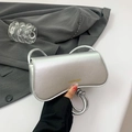 Minimalist silver rectangular handbag with knotted shoulder strap and metallic texture - Silver