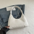 Minimalist ivory woven crescent hobo bag with a classic checkered texture and top handle - White