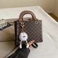 Retro monogram crossbody bag in dark brown with a white monster fur ball charm - With Pendant / Brown