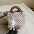 White checkered crossbody tote bag with brown handles and a cute plush monster charm - With Pendant / White