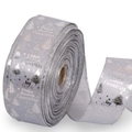 Close-up of silver Christmas ribbon roll with glittery Joy Love and Peace text - Silver Tree Print