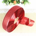 Detail of red glitter ribbon roll with wire edge for Christmas gift wrapping and decor - 10m Red Glitter Ribbon