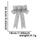 Silver glitter Christmas bow ornament decoration measuring 24.5cm by 18cm for holiday decor - Silver