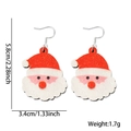 Glinsterende Kerstman hangorbellen met afmetingen 5,8 cm bij 3,4 cm op witte achtergrond - Kerstman