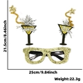 Black and gold 2026 New Year party glasses with stars and champagne bottle decor - New Year Glasses / Goblet