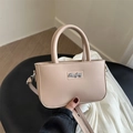 Minimalist apricot square crossbody handbag with dual cylindrical handles and metal logo - Khaki