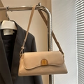 Minimalist beige leather shoulder bag with rectangular shape and golden clasp detail - Khaki