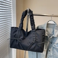 Schwarze Tragetasche aus Nylon mit Falten-Griffen und Schleifen für den Alltag - Schwarz