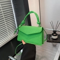 Bright green woven square handbag with chunky knot handle and adjustable crossbody strap - Green