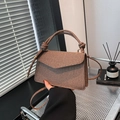 Chic brown woven shoulder bag with knotted handle and elegant envelope flap design - Brown
