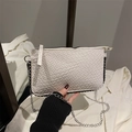 White woven crossbody bag with silver chain strap and minimalist leather rectangle design - White