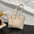 Minimalist creamy white large capacity tote bag with matching pouch in pebble grain leather - Off White
