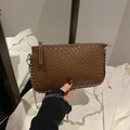 Brown woven crossbody bag with silver chain strap and intrecciato leather texture - Brown