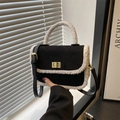 Mini black quilted crossbody bag with white faux fur trim and gold metallic clasp - Black