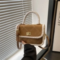 Brown suede crossbody bag with white shearling trim and golden twist lock detail - Brown