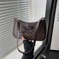 Brown baguette bag with M-letter print, leather shoulder strap, and bow detail - Brown