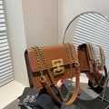 Chic vintage brown crossbody bag with gold geometric buckle and chain strap detail - Brown