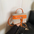 Minimalist cream canvas and orange leather crossbody bag with long tassels and handle - Orange