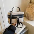 Minimalist beige canvas box bag with black leather trim and silver zipper details - Black