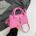 Y2K style bright pink mini crossbody bag with silver star metallic detail and dual handles - Pink