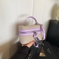 Minimalist purple leather and beige canvas crossbody bag with elegant fringe zipper detail - Purple
