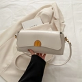 Chic cream white rectangle shoulder bag with gold clasp and elegant thin strap - White