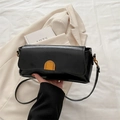 Minimalist black faux leather rectangular crossbody bag with golden U-shaped metal clasp - Black