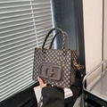Braune Vintage-Monogramm-Einkaufstasche mit G-Logo-Prägung und doppelten Griffen - Braun