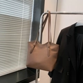 Minimalist coffee brown faux leather tote bag with adjustable strap and front lettering - Brown