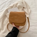 Minimalist camel brown crossbody bag featuring pleated faux leather texture and text print - Brown