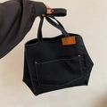 Bolso tote de lona negra con parche de cuero marrón y correas para mujer - Negro