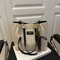 Minimalist beige woven straw tote bag with black leather logo and tassel charm - With Pendant / Black