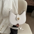 Elegant creamy white half-moon saddle bag with a golden metal lock and leather strap - White