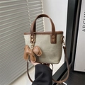 Bean green canvas bucket bag with brown leather trim and a cute puppy charm - With Pendant / Brown and Khaki