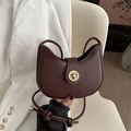 Dark coffee crescent shoulder bag in smooth faux leather with gold metallic buckle - Brown