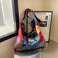Ethnic patchwork tote bag with colorful geometric patterns and denim bow shoulder strap - Colorful