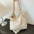 Bolso tote de lona beige con flores, asas de cuerda naranja y colgante de león - Con Colgante / Oso de Cinta Beige