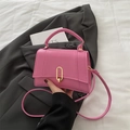 Pink faux leather crossbody square bag with gold oval lock and top handle - Pink