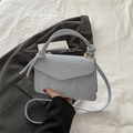 Minimalist light blue square handbag with gathered texture and golden hardware accents - Large / Blue