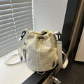 Chic cream nylon drawstring bucket bag with mesh pocket and woven shoulder strap - White