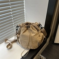 Chic khaki nylon drawstring bucket bag with adjustable strap and side mesh pocket - Khaki