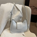 Minimalist creamy white leather underarm bag with adjustable strap and front flap detail - White