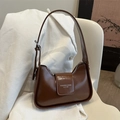 Brown glossy PU leather underarm bag with white logo and adjustable shoulder strap - Tan