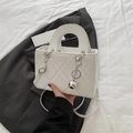Chic white quilted square crossbody bag with top handle and silver ball charm - White