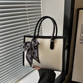 Chic off-white tote bag with black trim and heart pattern scarf detail - Black